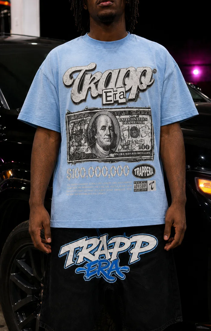 Close view of the graphic print on a blue T-shirt.